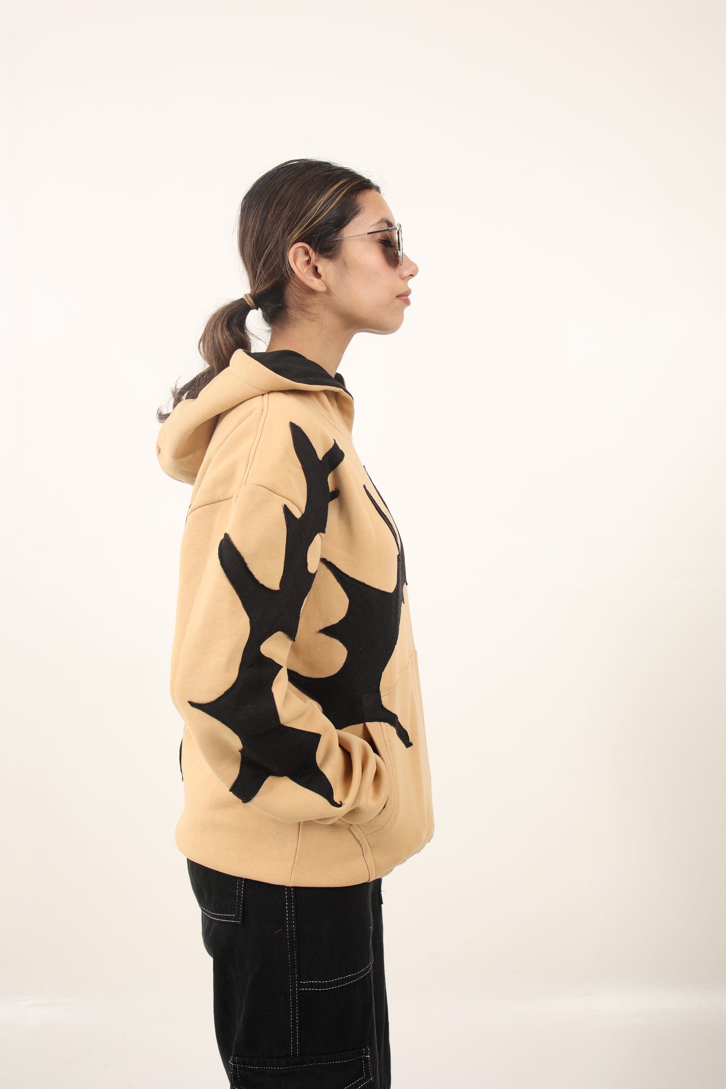 heavyweight oversized custom beige hoodie representing sustainable fashion