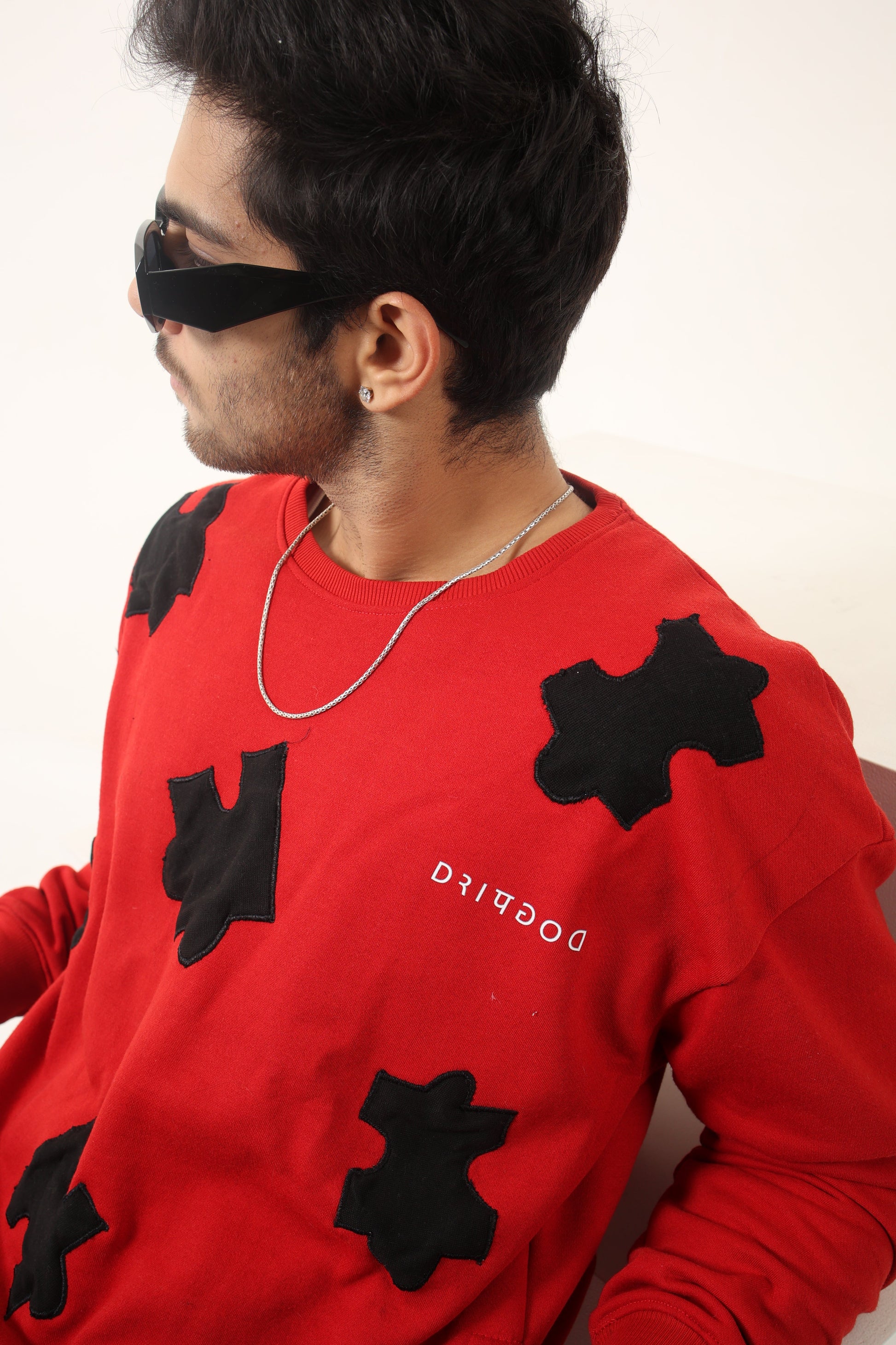 heavyweight oversized custom red hoodie representing sustainable fashion
