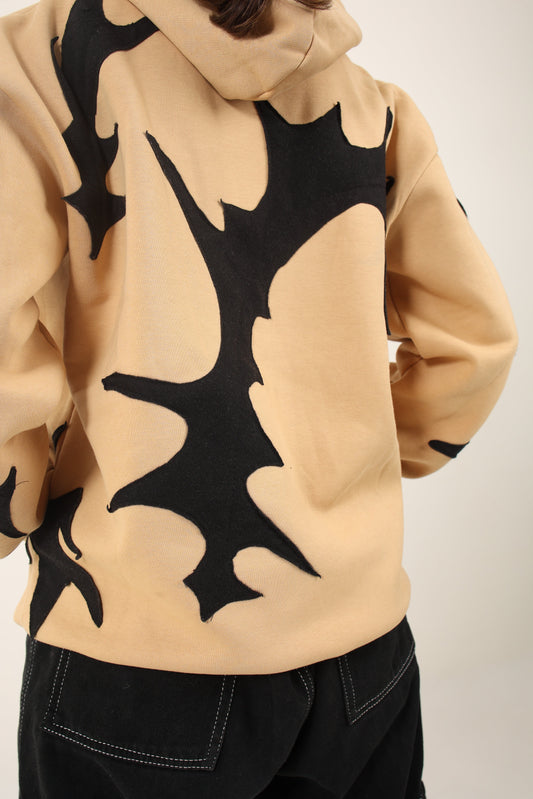 heavyweight oversized custom beige hoodie representing sustainable fashion