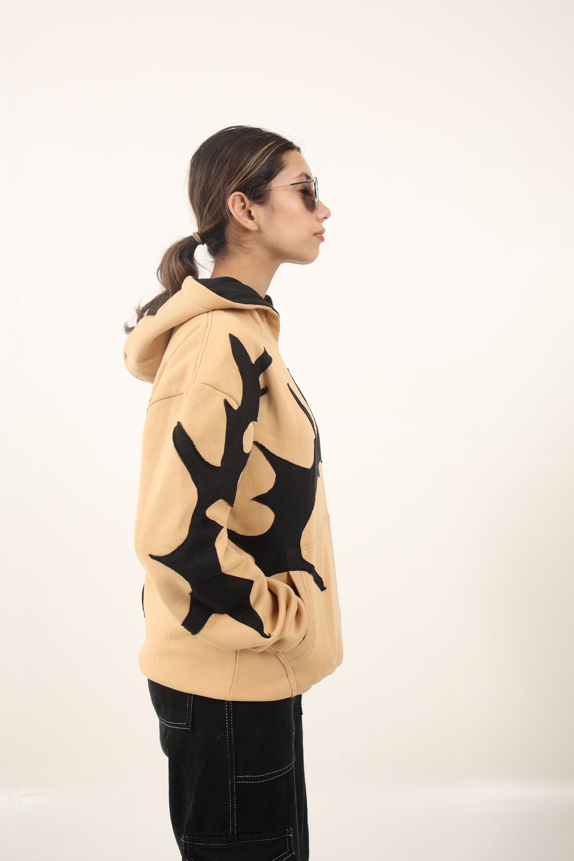 heavyweight oversized custom beige hoodie representing sustainable fashion